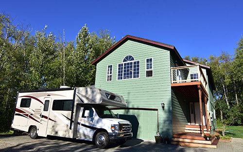 RV in front of house